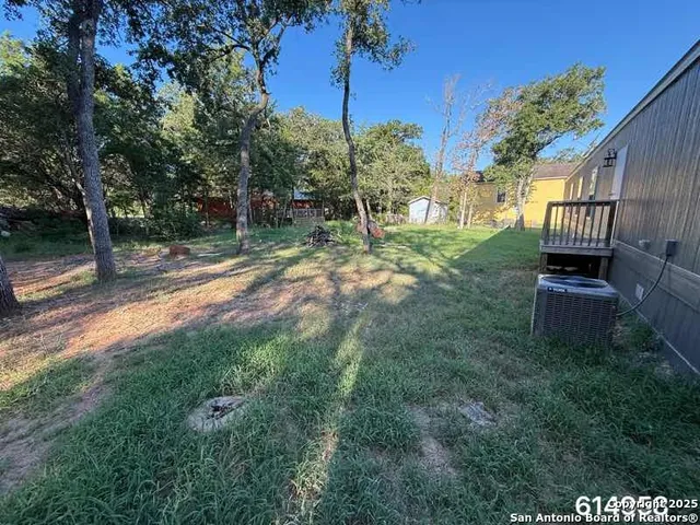 a view of a backyard with a garden