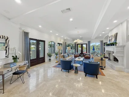 a view of a swimming pool with a patio