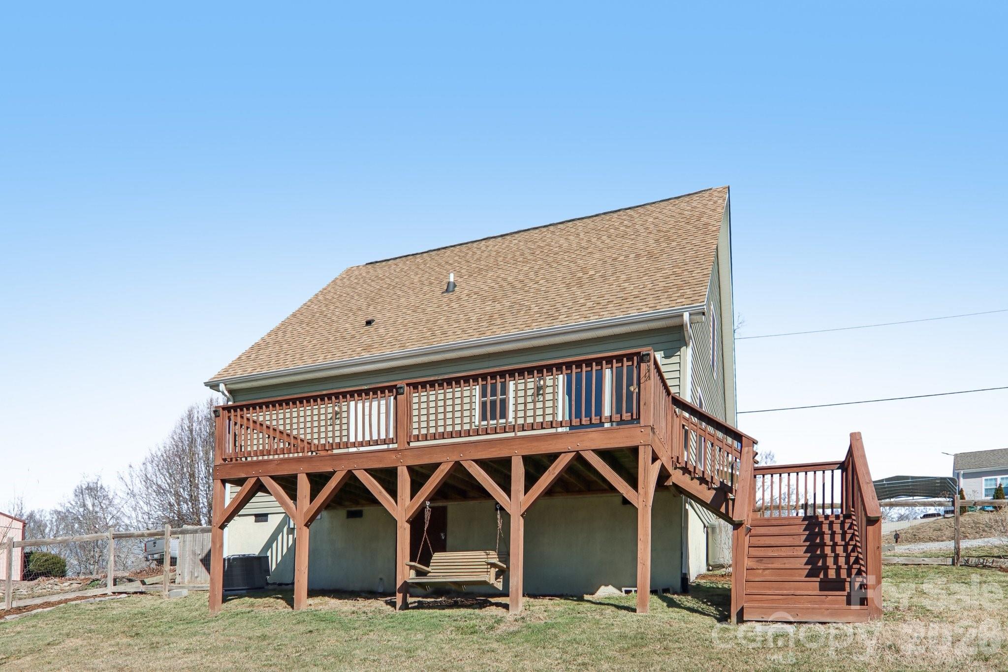 751 Hutch Mountain Road Fletcher, NC 28732 - Photo 42 of 48 a front view of a house with garden