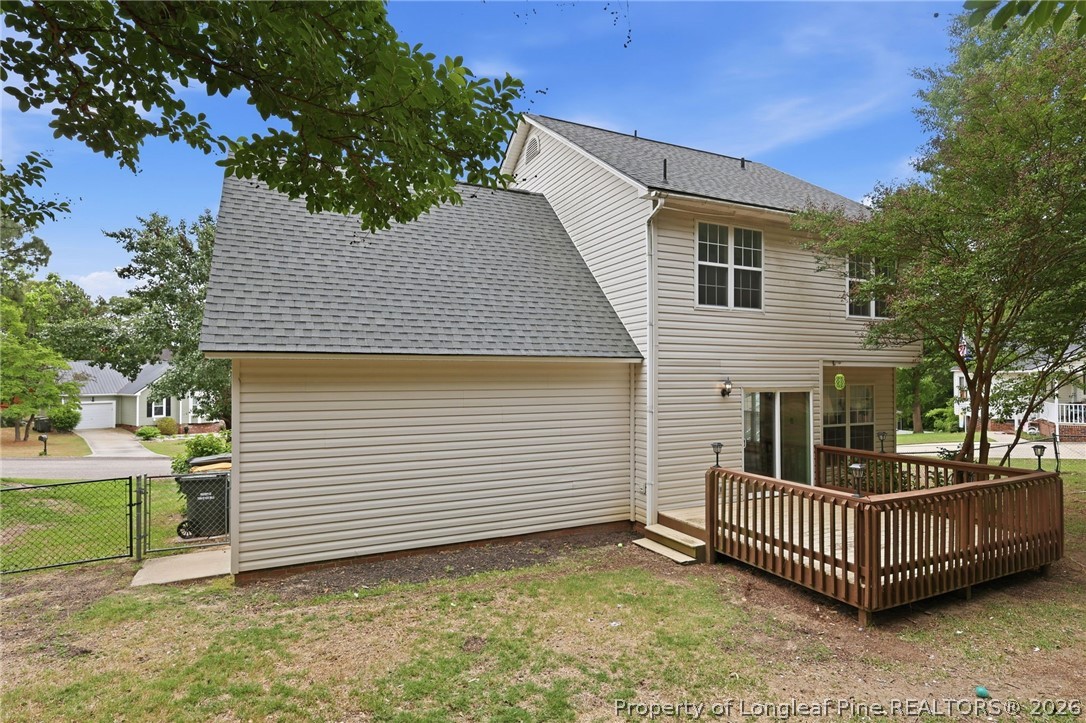 5113 Archer Road Hope Mills, NC 28348 - Photo 39 of 41 a front view of a house with a garden
