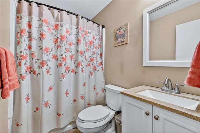 a view of a livingroom with a staircase