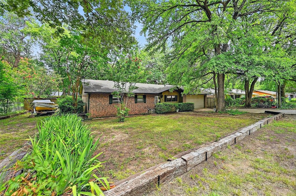 164 Ash Denison, TX 75020 - Photo 2 of 29 a view of a house with backyard
