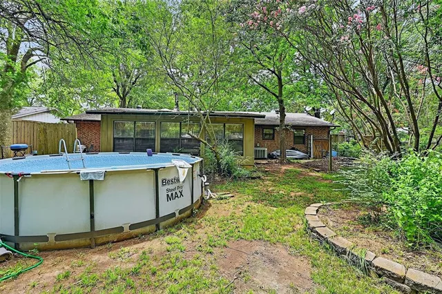 a view of a two chairs in patio