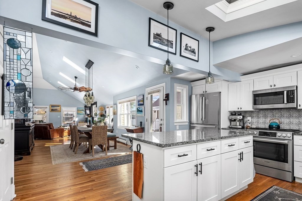 103 Newport Road Hull, MA 02045 - Photo 12 of 40 a kitchen with stainless steel appliances lots of counter top space