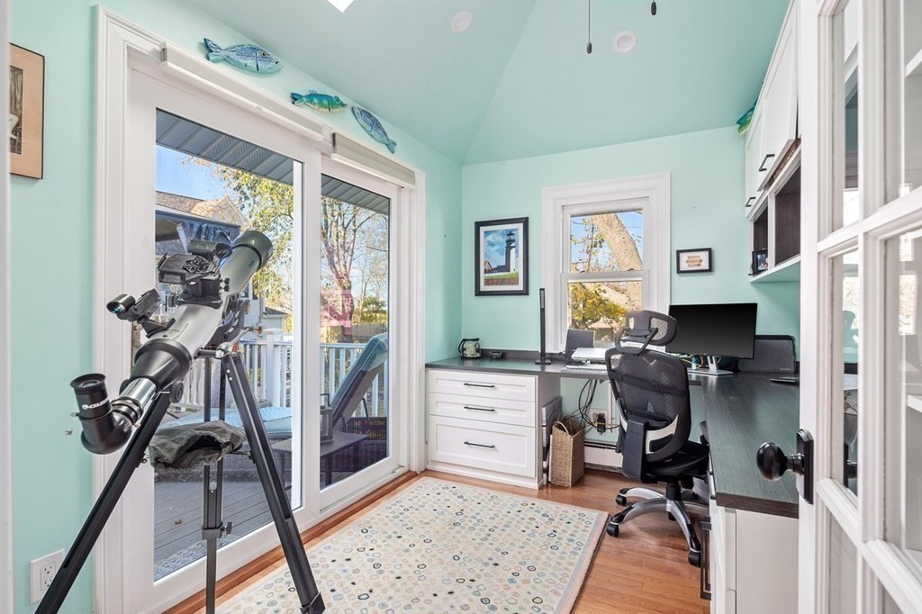 103 Newport Road Hull, MA 02045 - Photo 18 of 40 a view of a workspace with furniture and a livingroom