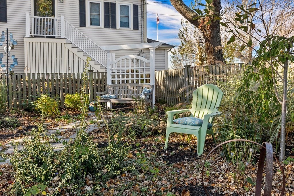 103 Newport Road Hull, MA 02045 - Photo 30 of 40 a view of a chair and table in the backyard