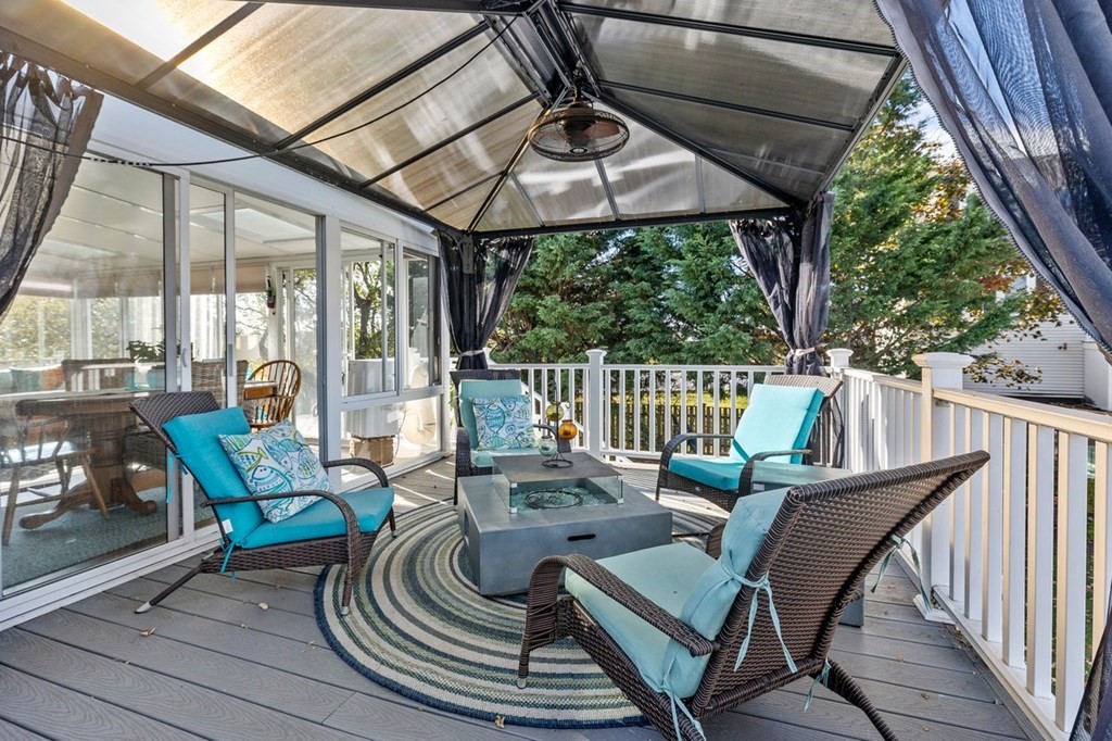 103 Newport Road Hull, MA 02045 - Photo 32 of 40 a view of a patio on the deck