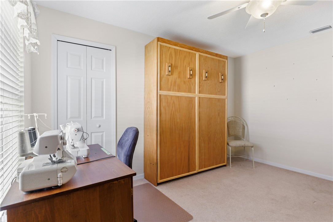 594 Cottonwood Road Sebastian, FL 32958 - Photo 13 of 27 a view of bathroom with a tub shower and mirror