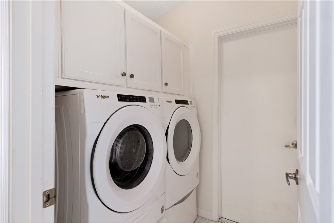 594 Cottonwood Road Sebastian, FL 32958 - Photo 14 of 27 a utility room with dryer and washer