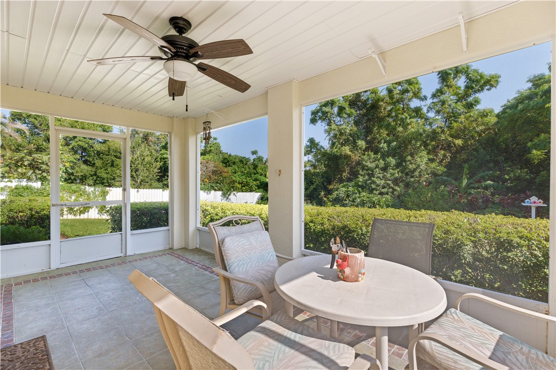 594 Cottonwood Road Sebastian, FL 32958 - Photo 15 of 27 a outdoor dining space with furniture and garden view