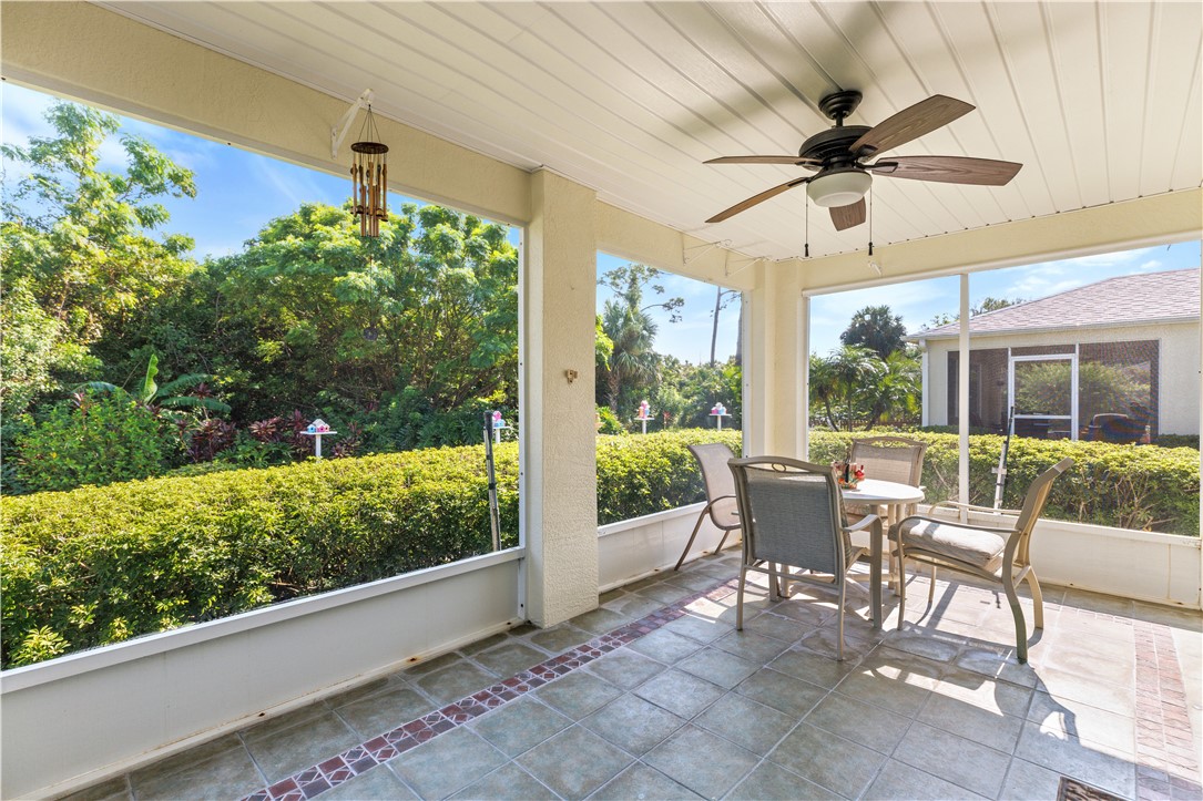 594 Cottonwood Road Sebastian, FL 32958 - Photo 17 of 27 a view of a porch with furniture and a yard