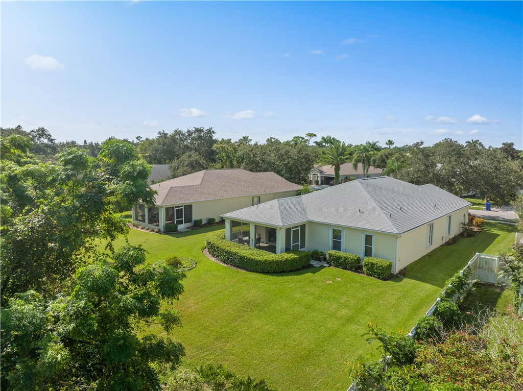 594 Cottonwood Road Sebastian, FL 32958 - Photo 19 of 27 an aerial view of a house with swimming pool and mountains