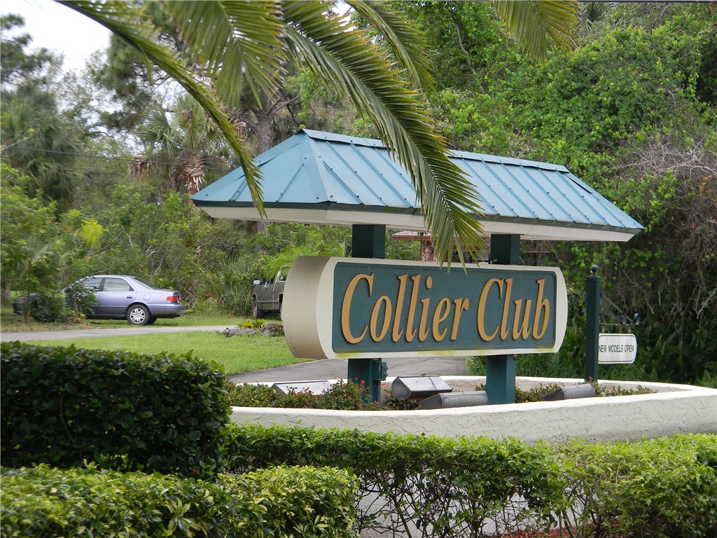 594 Cottonwood Road Sebastian, FL 32958 - Photo 2 of 27 a front view of a house with garden