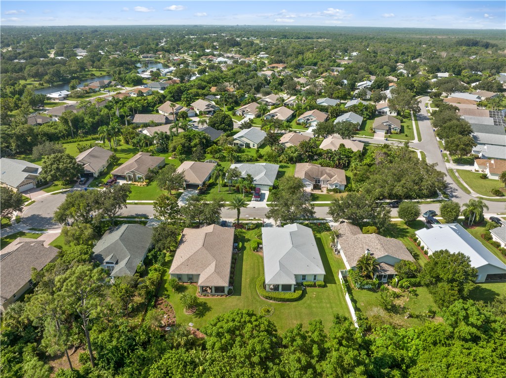 594 Cottonwood Road Sebastian, FL 32958 - Photo 23 of 27 an aerial view of residential houses with outdoor space
