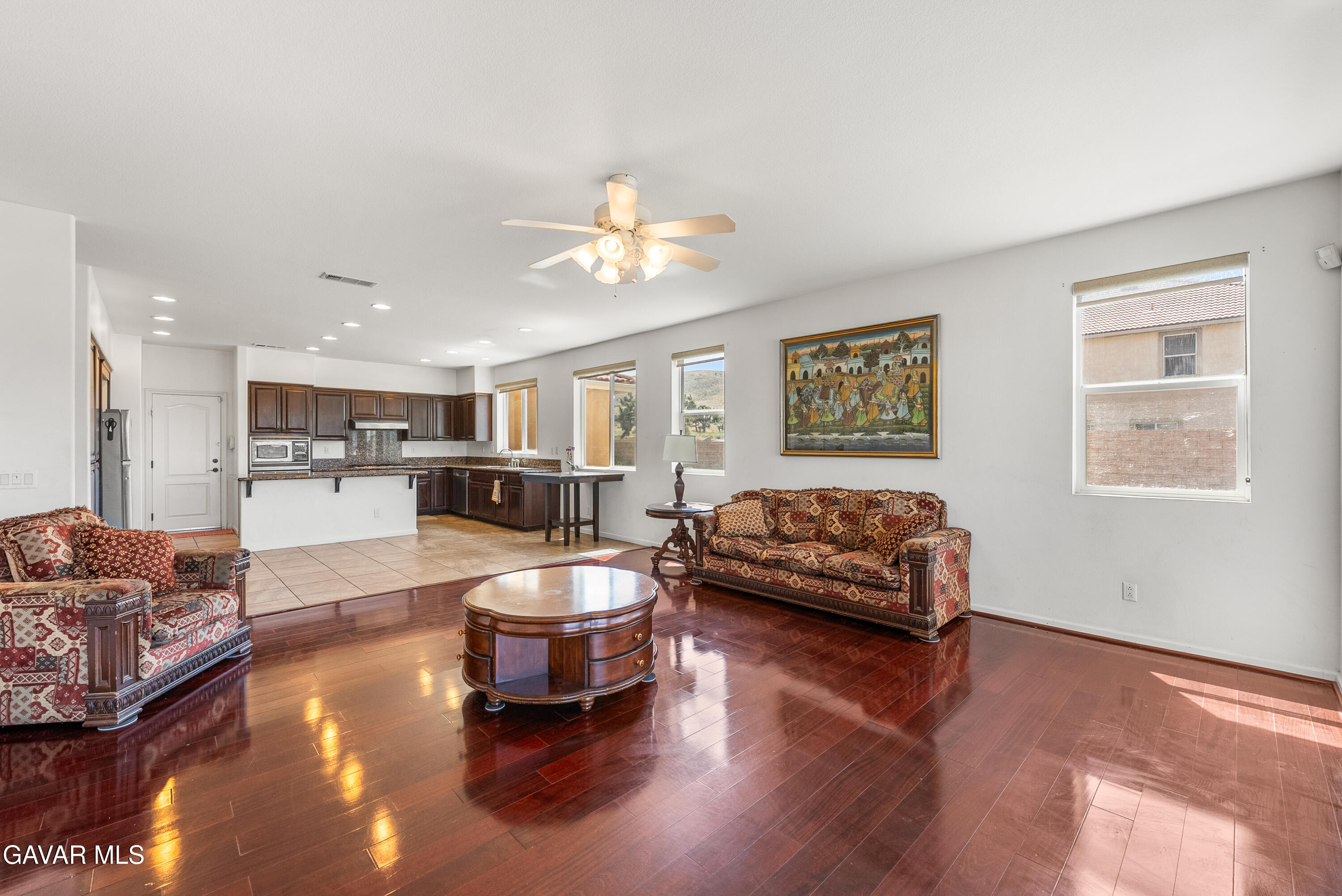 658 Lago Lindo Road Palmdale, CA 93550 - Photo 26 of 91 a living room with furniture and kitchen view