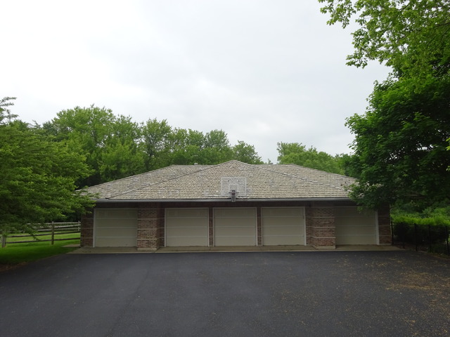 32W546 Rochefort Lane Wayne, IL 60184 - Photo 21 of 25 a backyard of a house with lots of green space