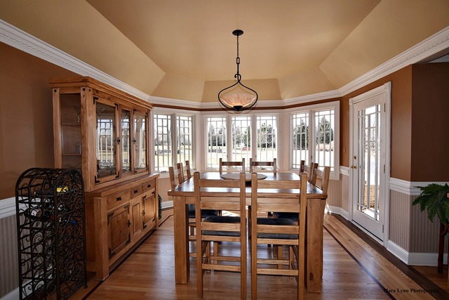 32W546 Rochefort Lane Wayne, IL 60184 - Photo 4 of 25 a view of a dining room with furniture window and wooden floor