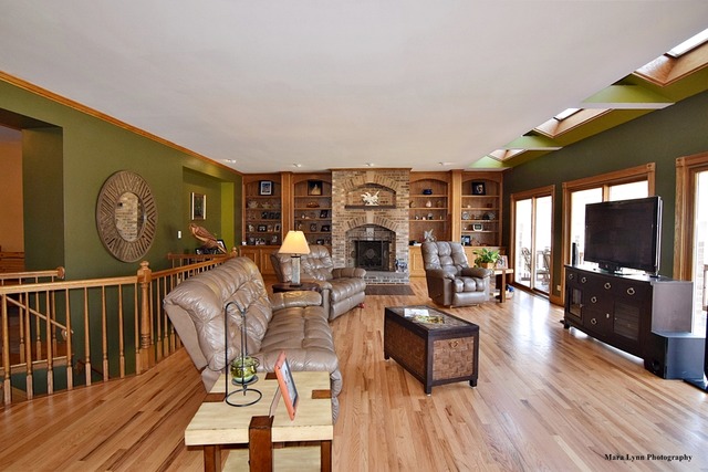 32W546 Rochefort Lane Wayne, IL 60184 - Photo 7 of 25 a living room with furniture and wooden floor