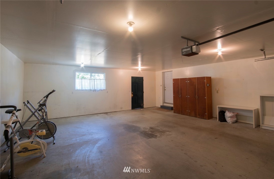 465 Guy Kelly Road Port Angeles, WA 98362 - Photo 20 of 31 a view of a room with gym equipment