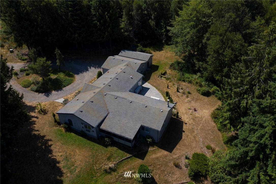 465 Guy Kelly Road Port Angeles, WA 98362 - Photo 29 of 31 an aerial view of a house with a yard