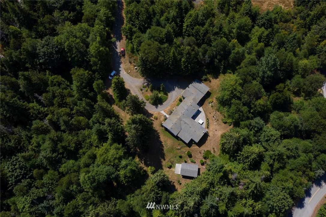 465 Guy Kelly Road Port Angeles, WA 98362 - Photo 31 of 31 an aerial view of a house with a yard