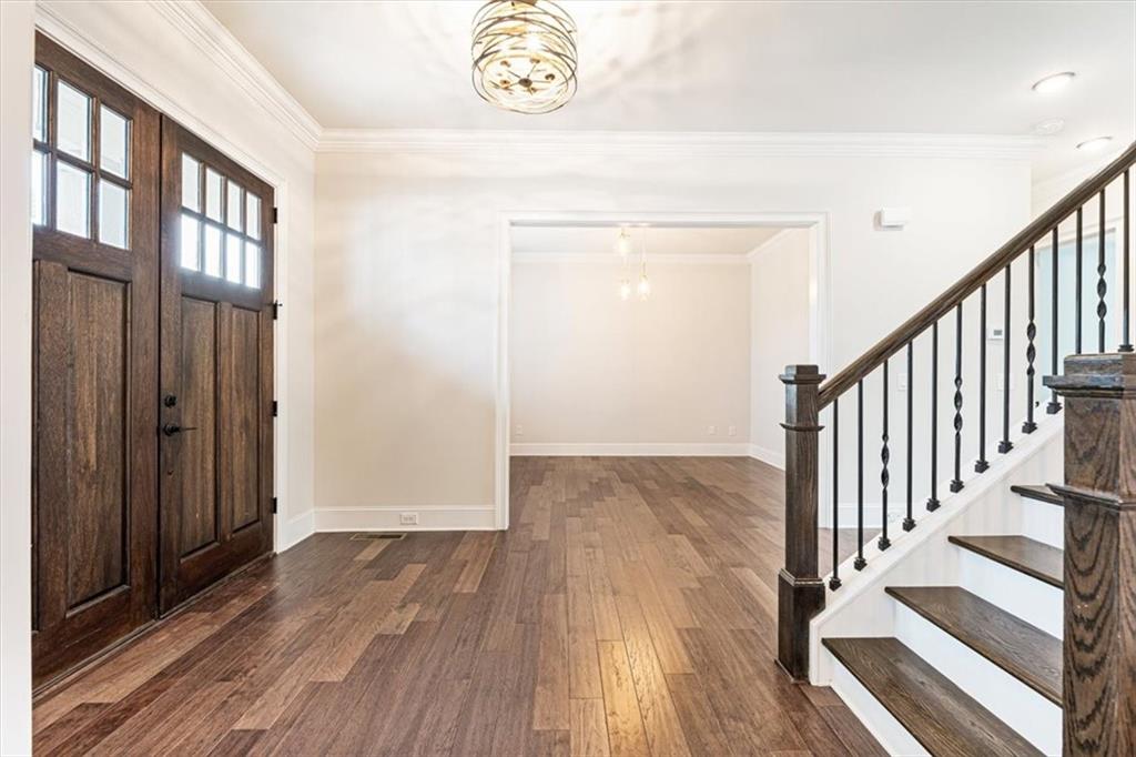 947 Hunter Way Milton, GA 30004 - Photo 13 of 78 a view of a hallway with wooden floor