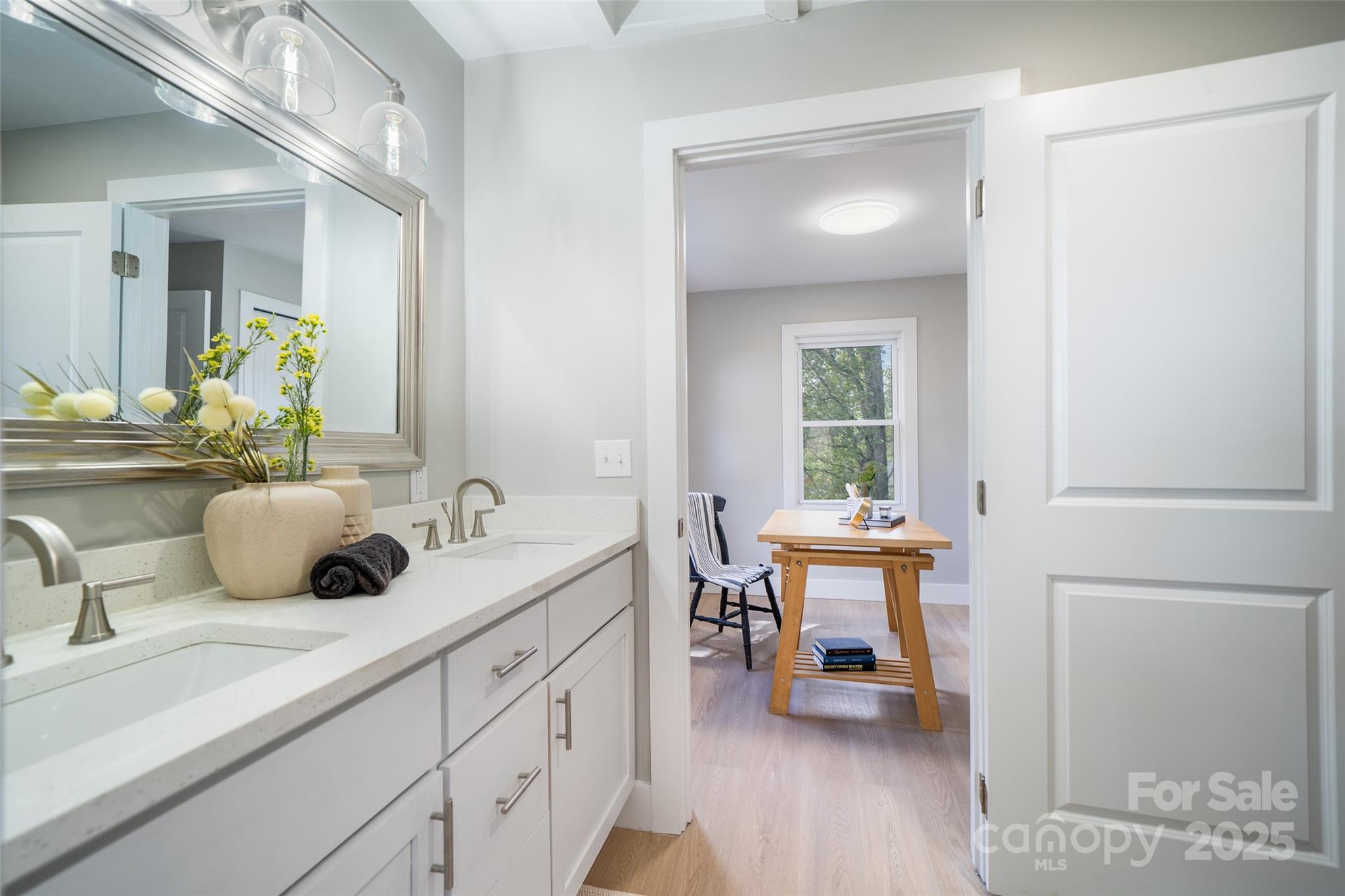 300 Pisgah View Road Asheville, NC 28806 - Photo 17 of 29 a bathroom with a sink and a mirror