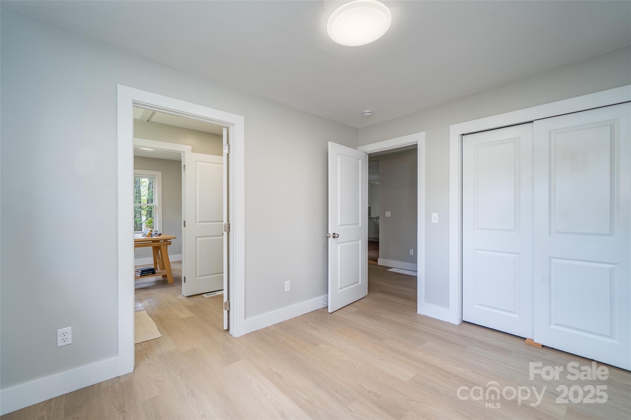 300 Pisgah View Road Asheville, NC 28806 - Photo 18 of 29 an empty room with closet and a bathroom