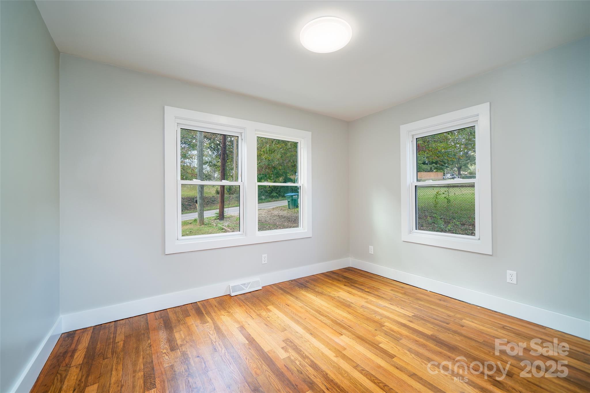 300 Pisgah View Road Asheville, NC 28806 - Photo 22 of 29 an empty room with a window