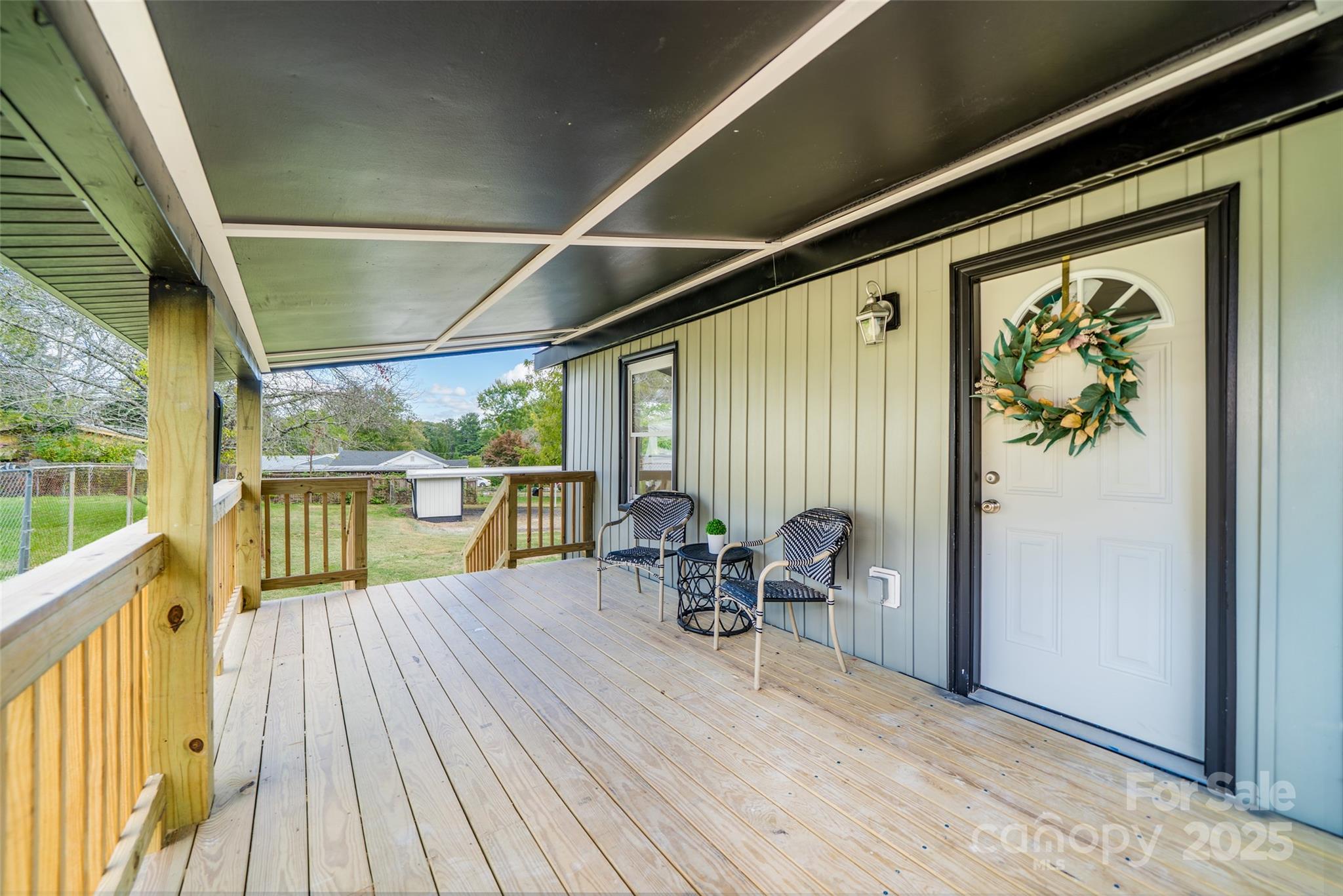 300 Pisgah View Road Asheville, NC 28806 - Photo 25 of 29 a view of a balcony with chairs