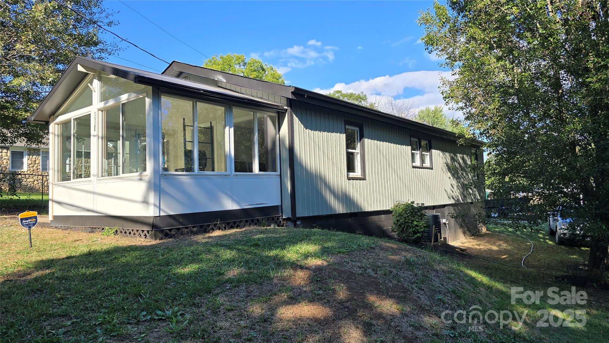 300 Pisgah View Road Asheville, NC 28806 - Photo 3 of 29 a view of a small house with yard and tree s