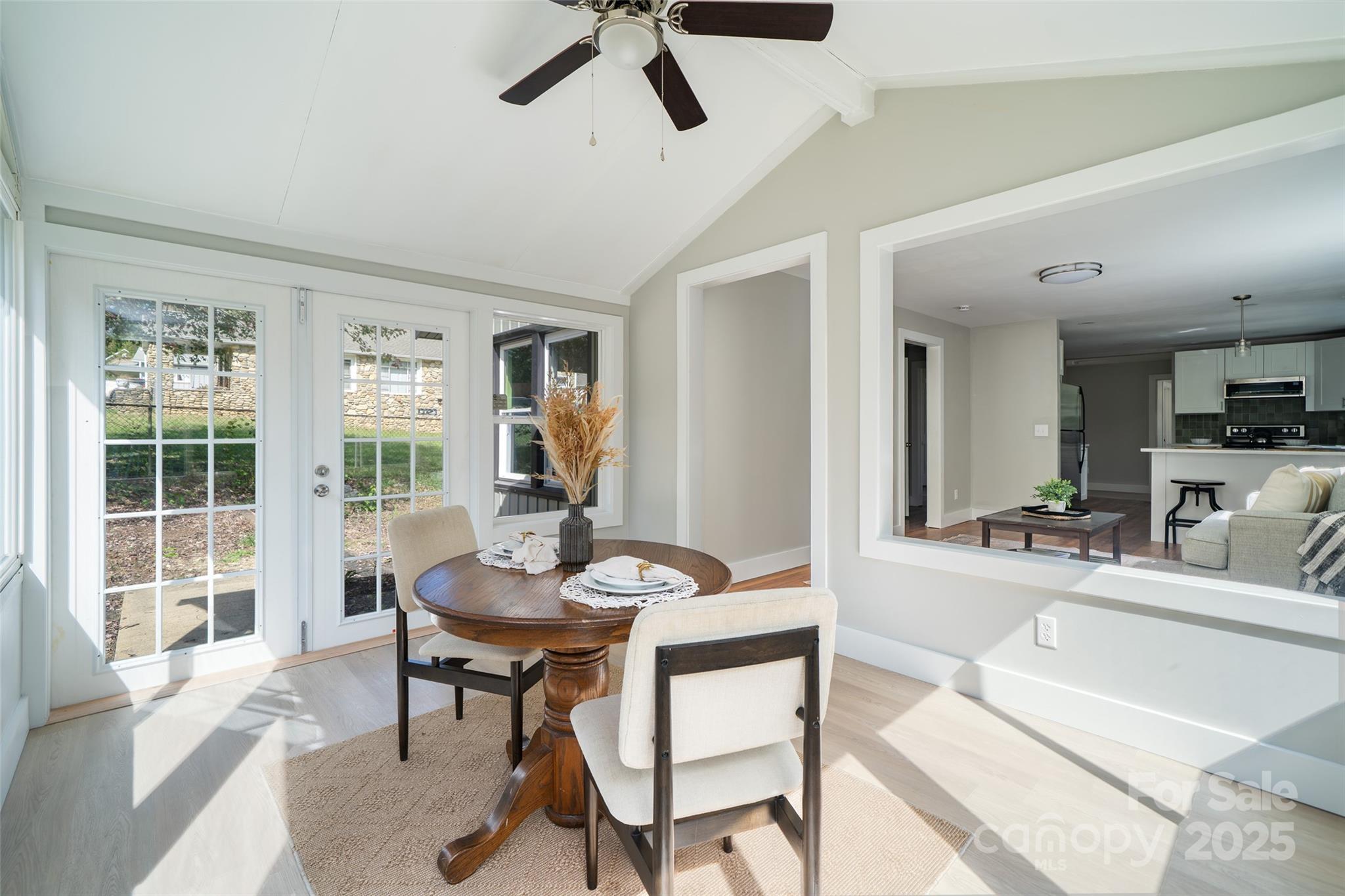 300 Pisgah View Road Asheville, NC 28806 - Photo 5 of 29 a living room with furniture and a large window