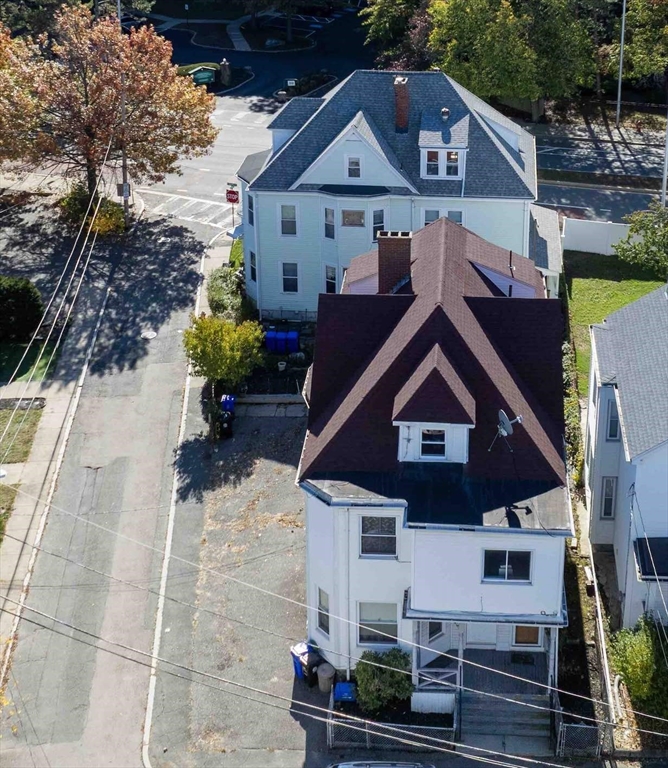 68-70 Waverly Street Malden, MA 02148 - Photo 3 of 7 a front view of a house with a yard