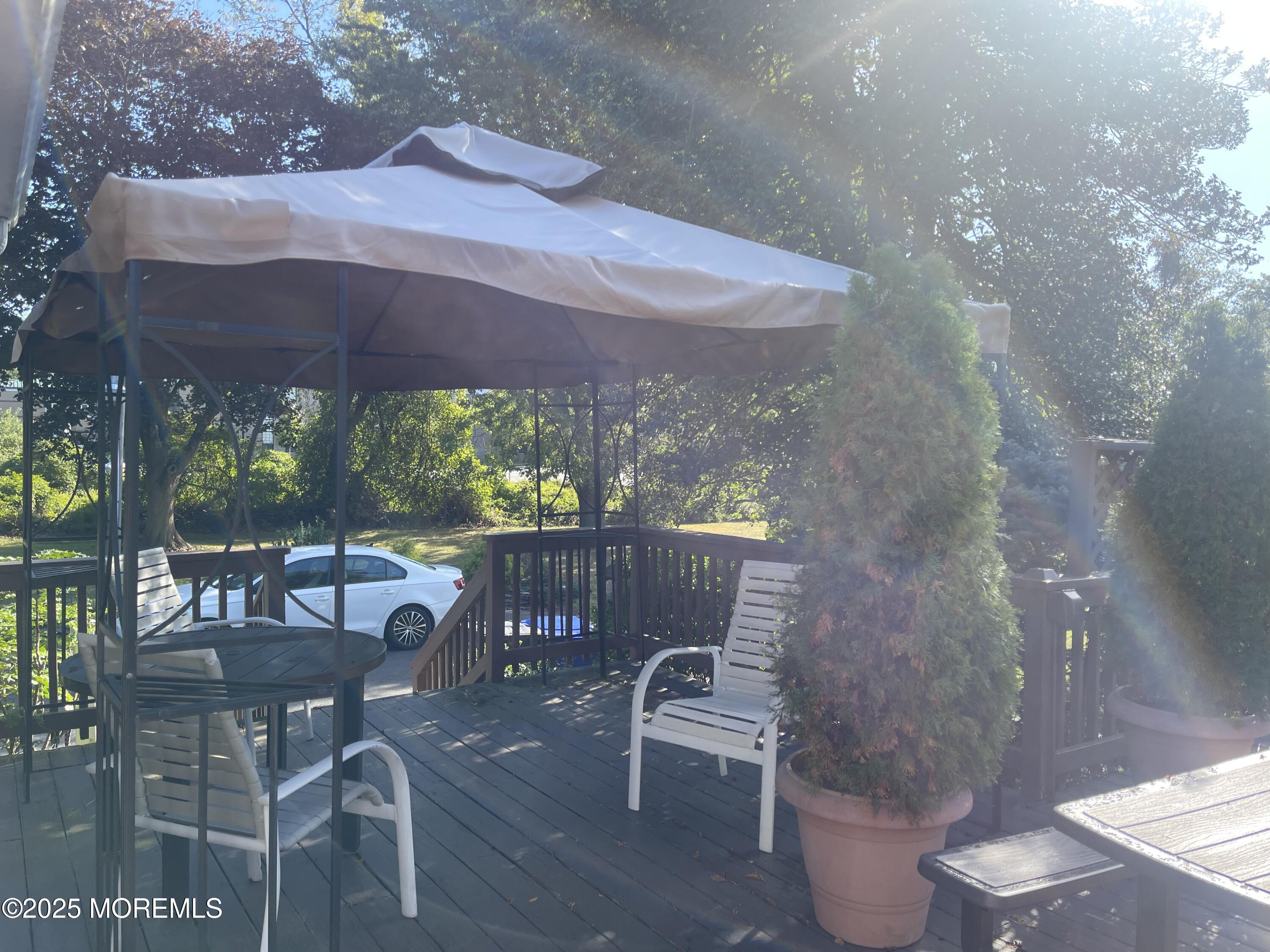 2023 Lanes Mill Road Brick, NJ 08724 - Photo 13 of 40 a patio with table and chairs