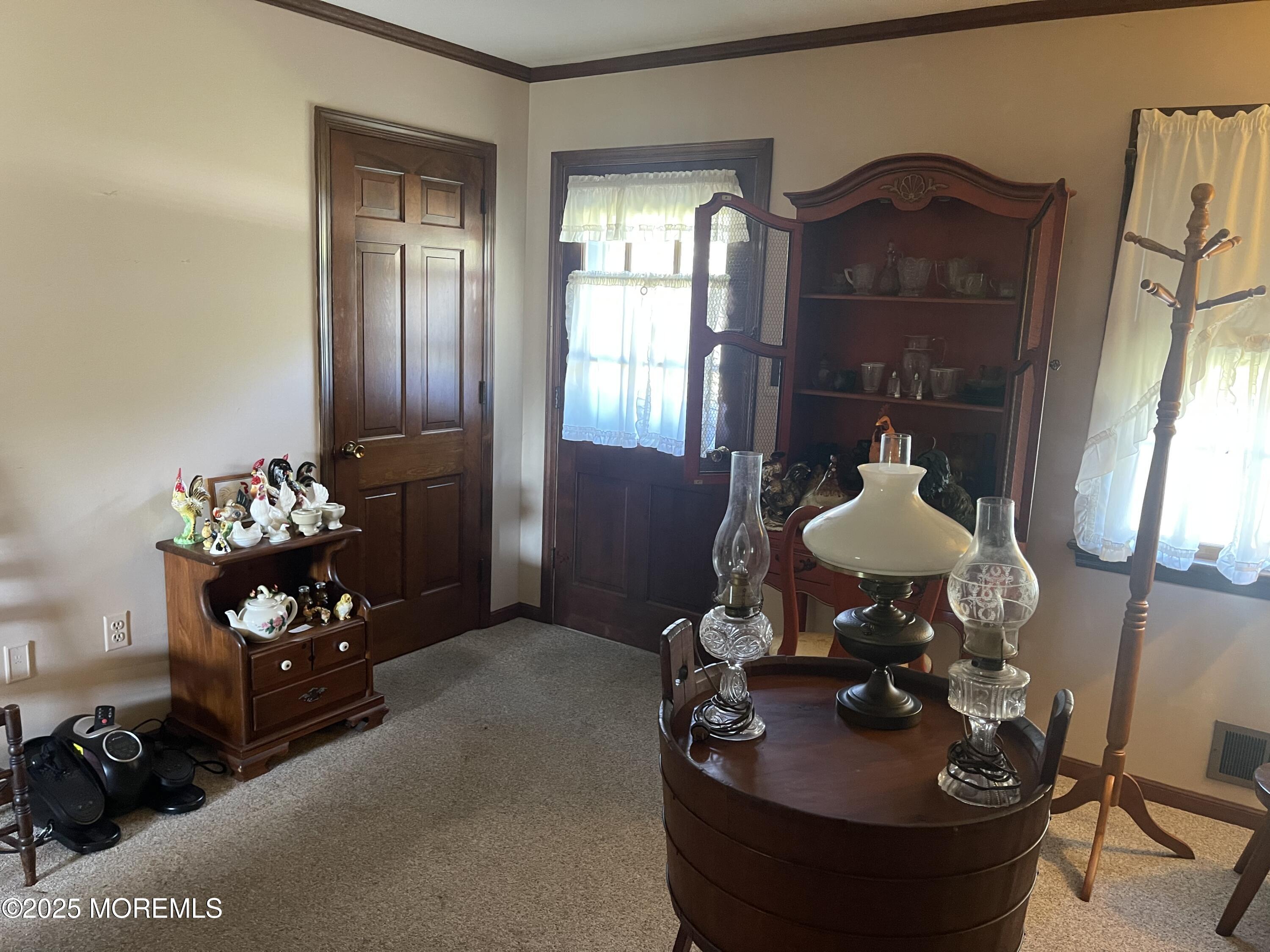 2023 Lanes Mill Road Brick, NJ 08724 - Photo 15 of 40 a living room with furniture and flowers