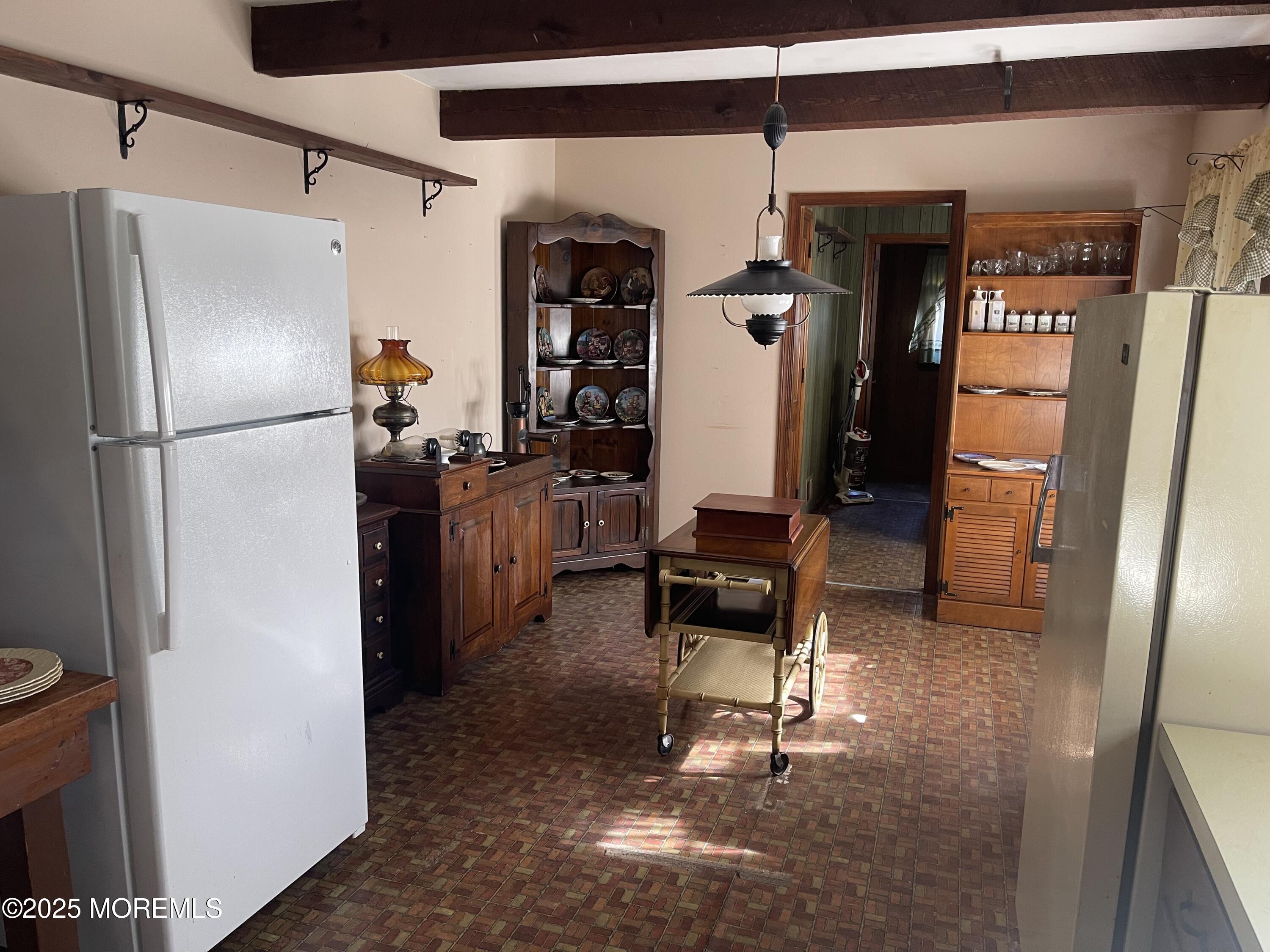 2023 Lanes Mill Road Brick, NJ 08724 - Photo 22 of 40 a kitchen with stainless steel appliances granite countertop a refrigerator and a sink