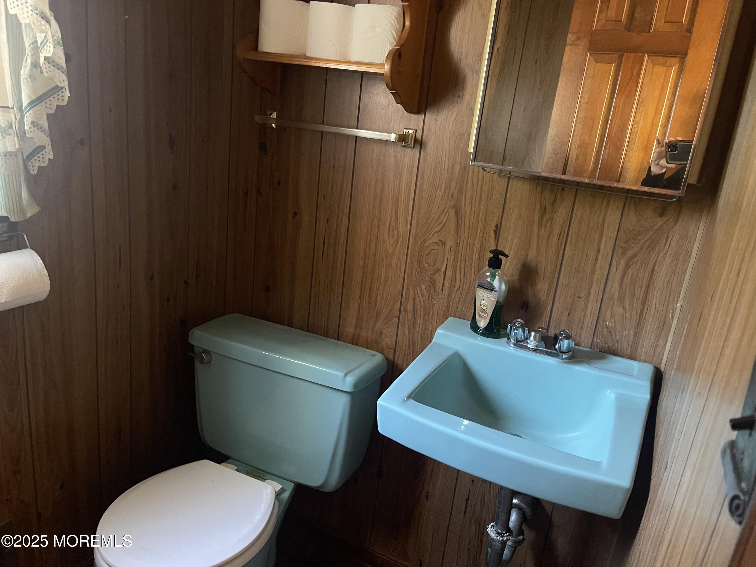 2023 Lanes Mill Road Brick, NJ 08724 - Photo 25 of 40 a bathroom with a toilet sink and tub