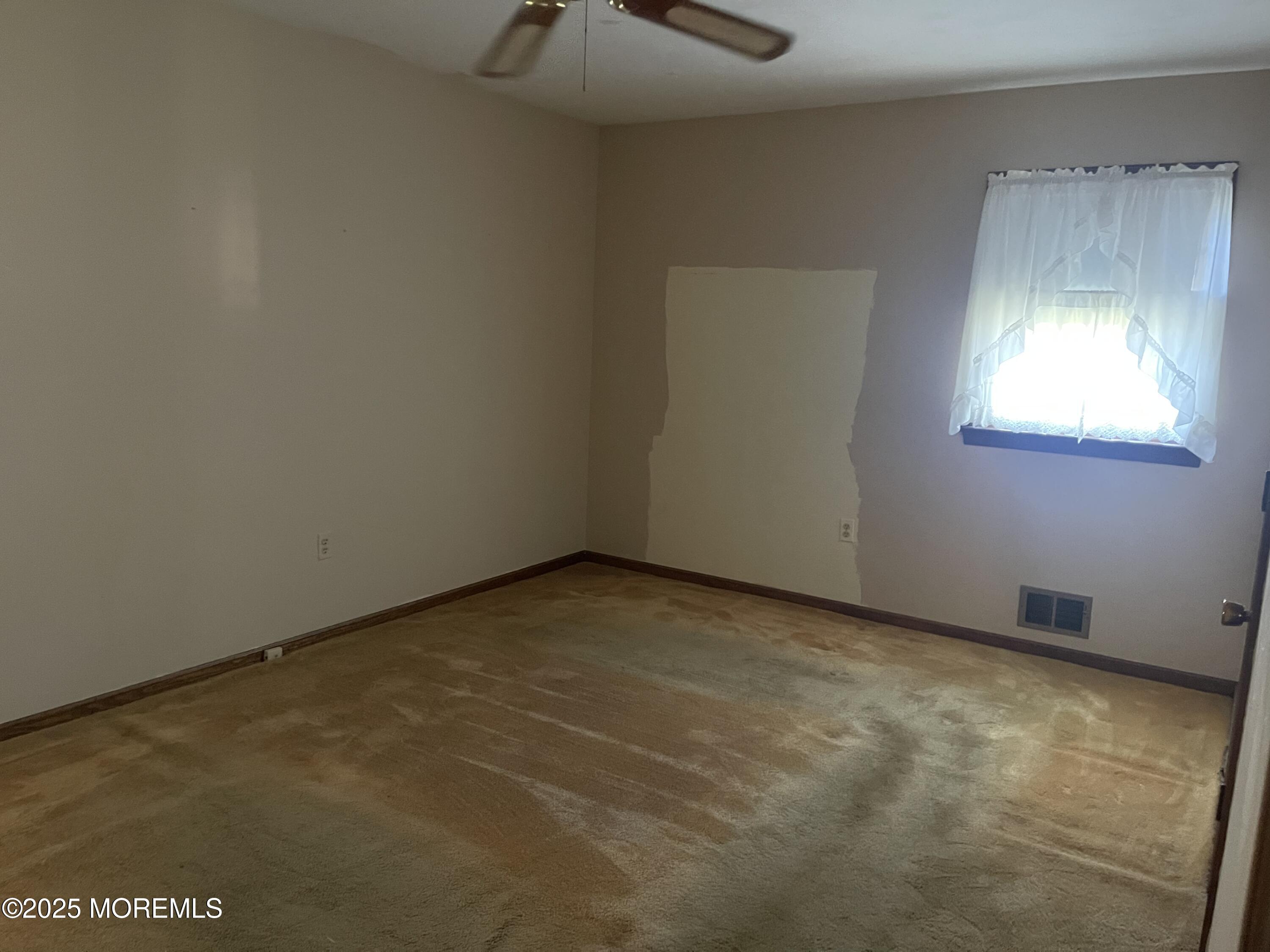 2023 Lanes Mill Road Brick, NJ 08724 - Photo 26 of 40 an empty room with a window
