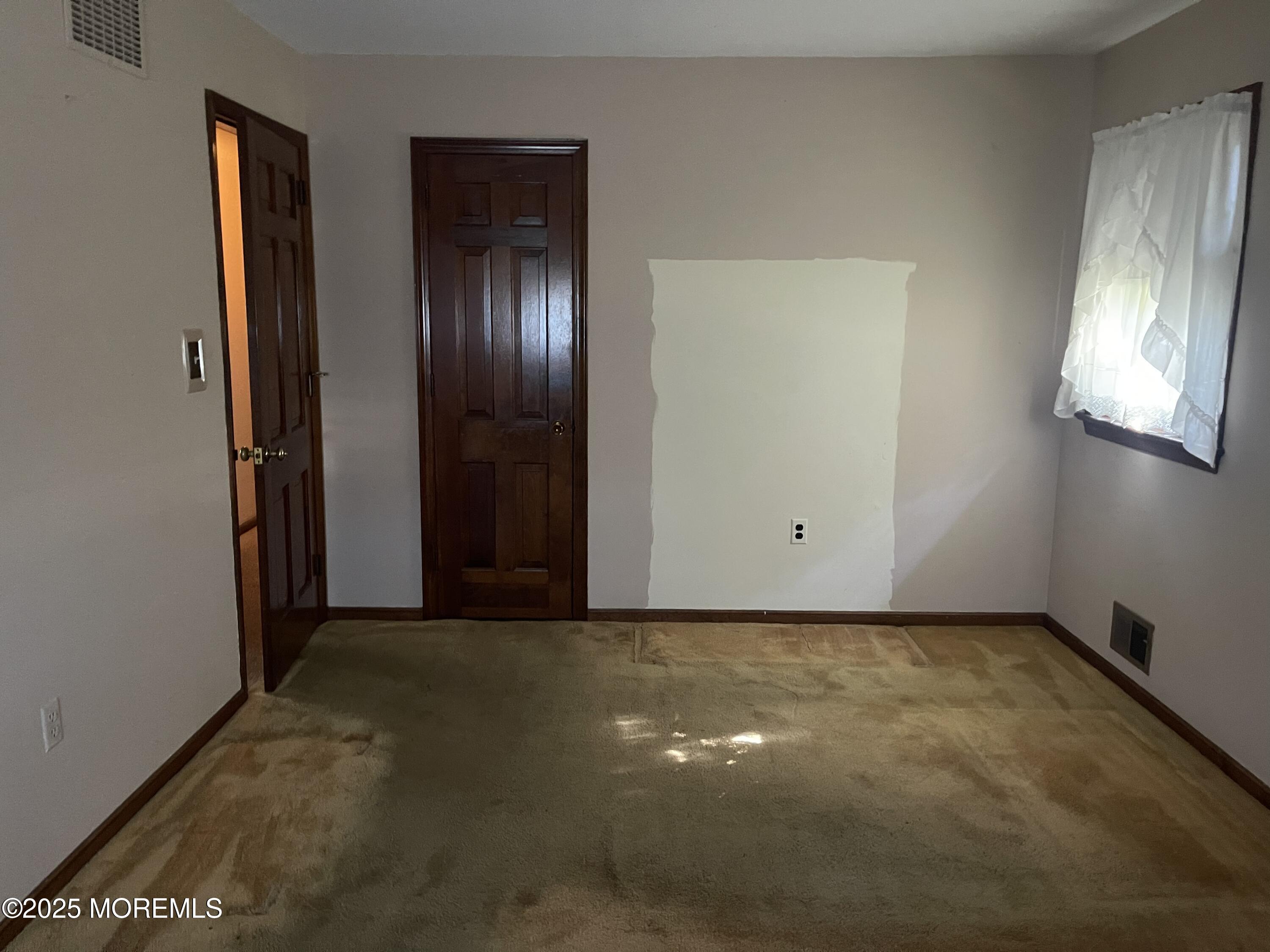 2023 Lanes Mill Road Brick, NJ 08724 - Photo 27 of 40 an empty room with windows