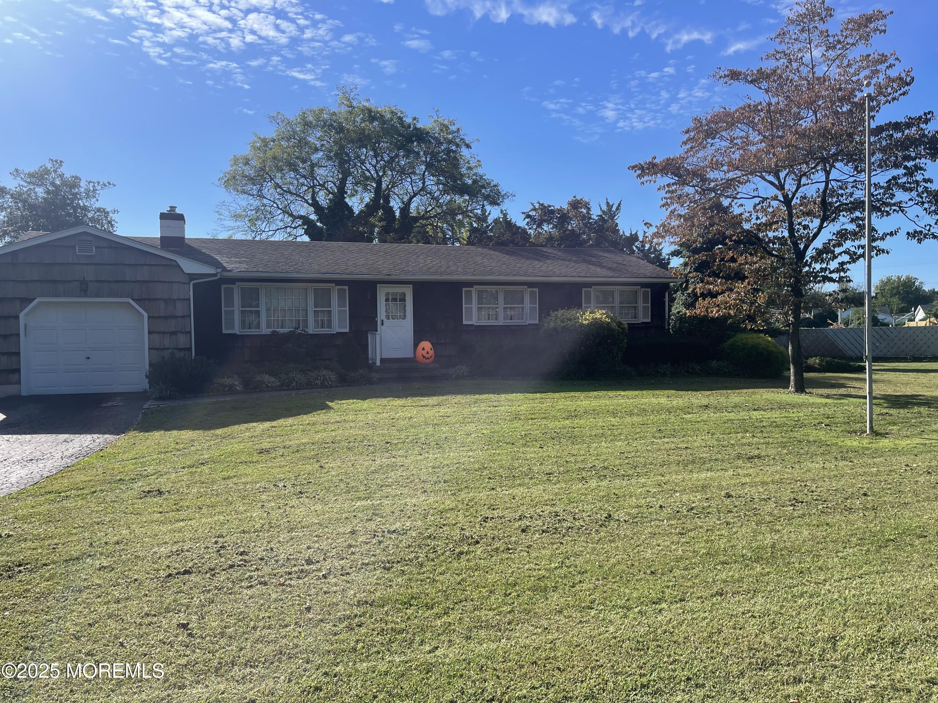 2023 Lanes Mill Road Brick, NJ 08724 - Photo 3 of 40 a house view with a garden space