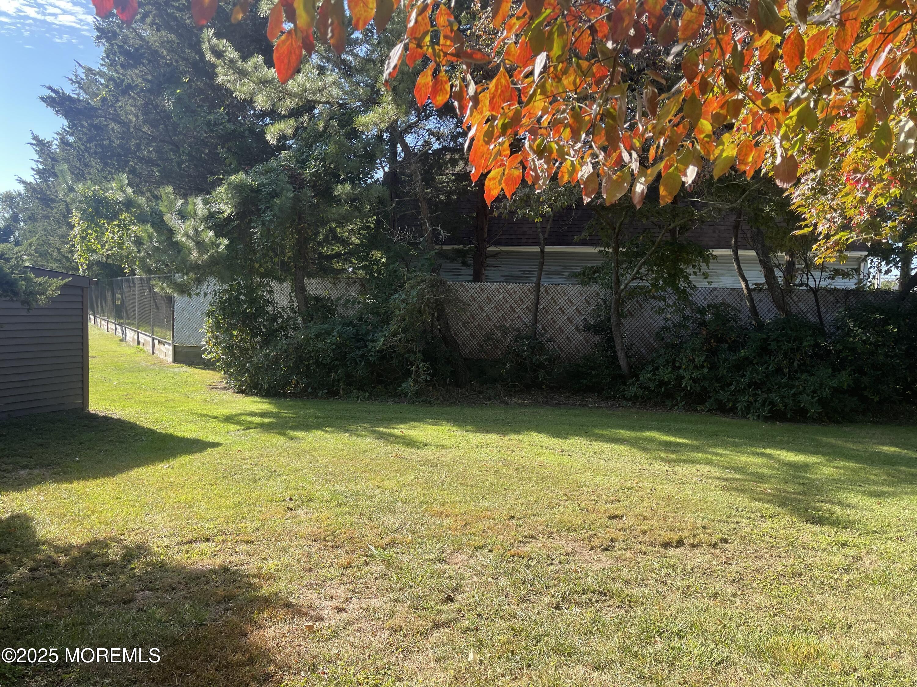 2023 Lanes Mill Road Brick, NJ 08724 - Photo 5 of 40 a view of a swimming pool with an outdoor space