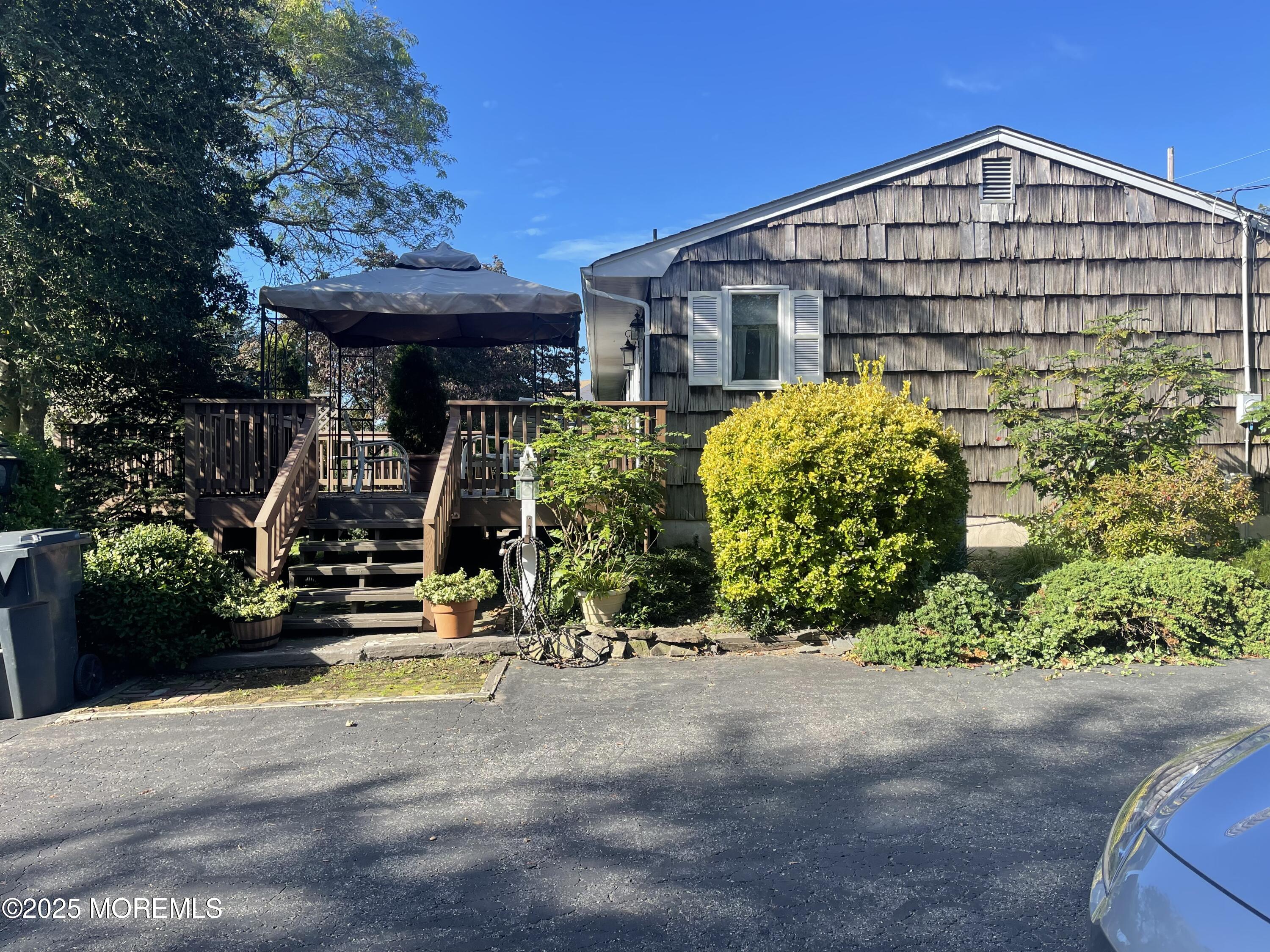 2023 Lanes Mill Road Brick, NJ 08724 - Photo 6 of 40 a front view of a house