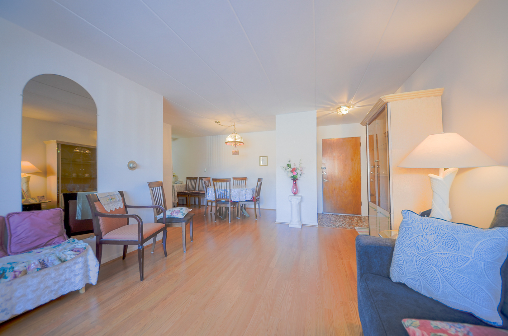 2521 Thatcher Avenue, Unit 2D River Grove, IL 60171 - Photo 2 of 10 a living room with furniture and a table