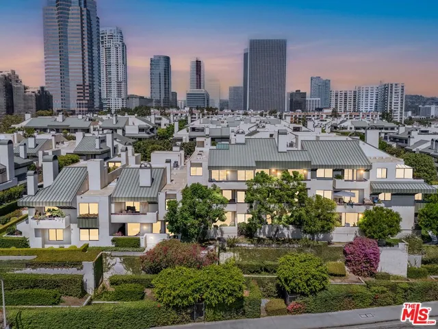 a view of a city with tall buildings