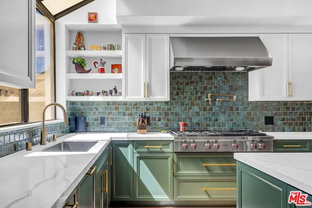 a bathroom with a toilet a sink and a mirror