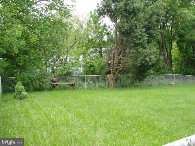 3327 Northmont Road Baltimore, MD 21244 - Photo 4 of 19 Fenced, rolling yard - great for play