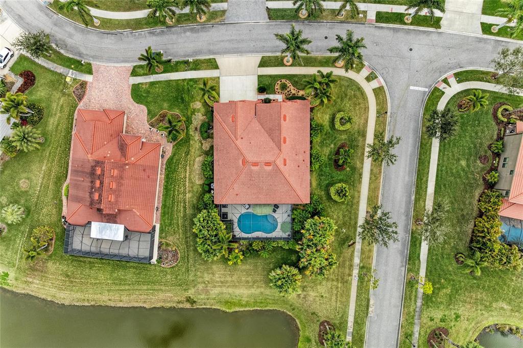 302 Cockle Shell Loop Apollo Beach, FL 33572 - Photo 46 of 75 an aerial view of house with a swimming pool