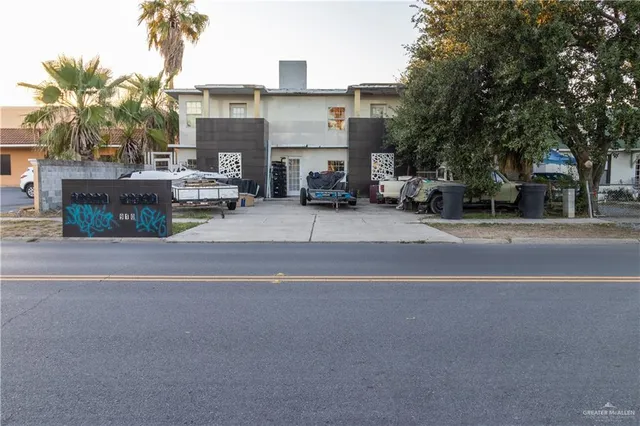 a view of road and car parked