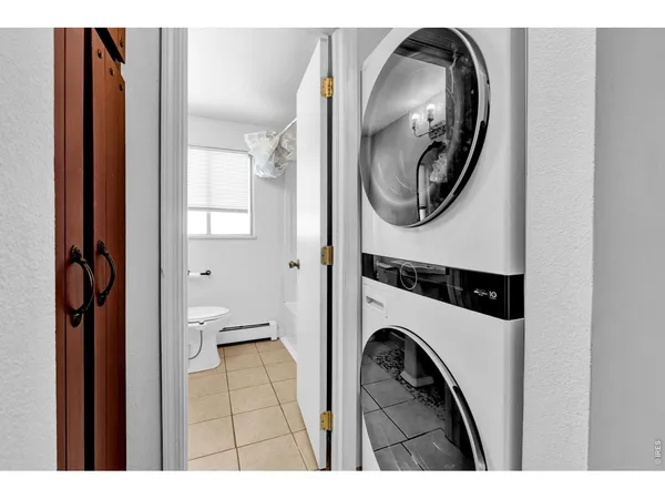 a view of a washer and dryer in a bathroom
