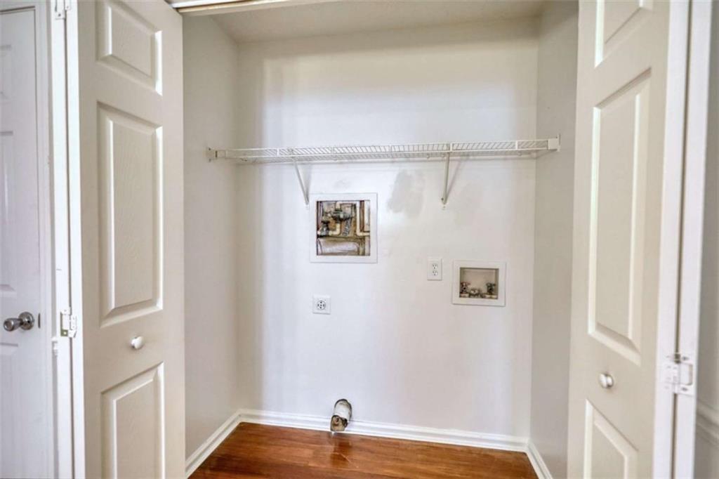 5185 Tew Lane Southwest Covington, GA 30014 - Photo 20 of 42 a view of walk in closet with window